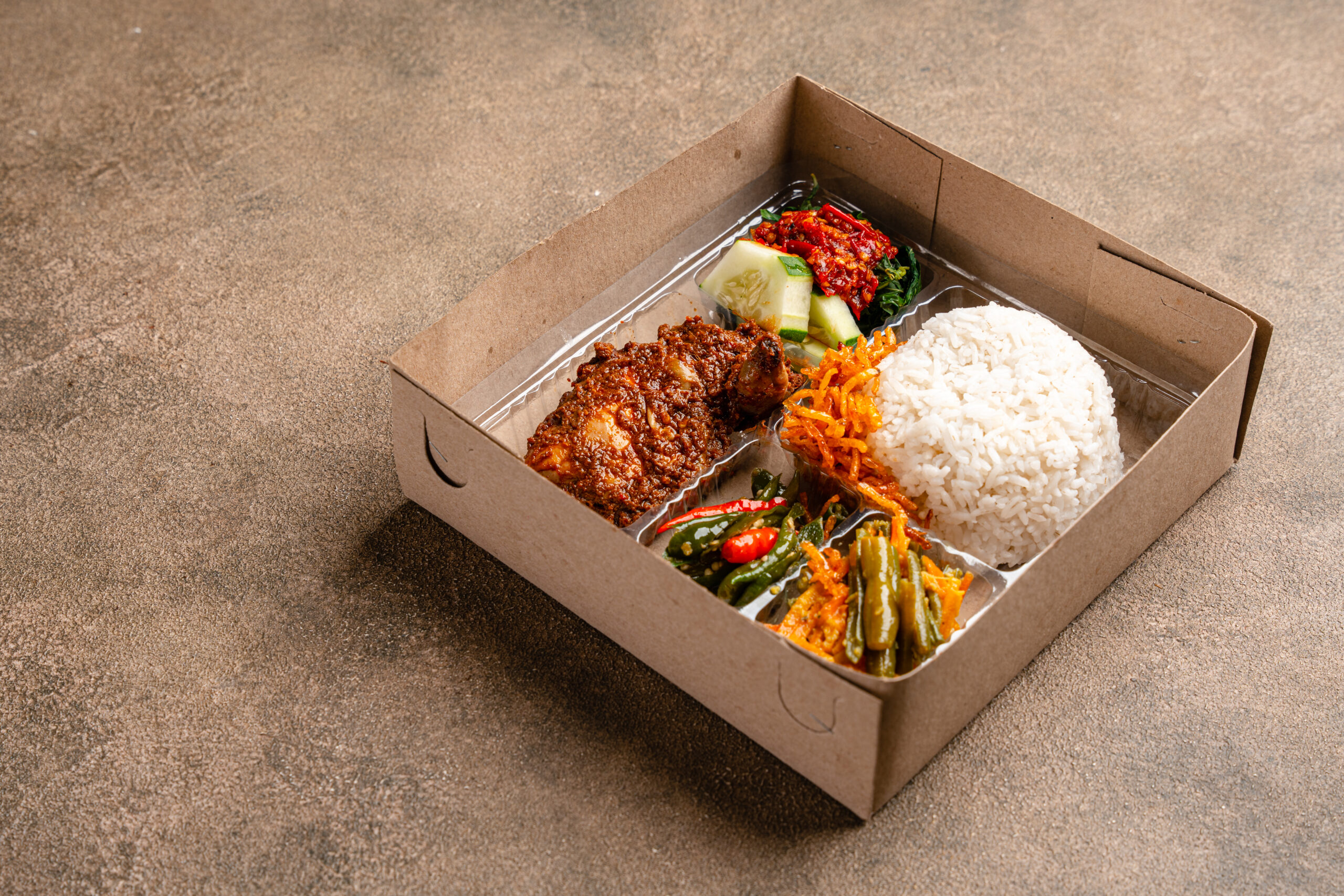 indonesian-it-is-called-rice-box-nasi-kotak-with-ayam-rendang-3-scaled